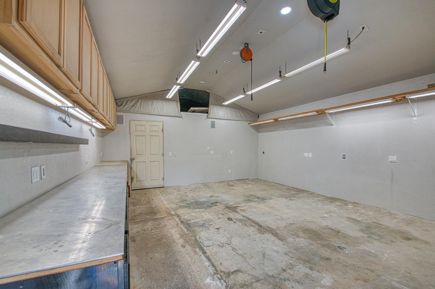 33717 River Knolls Road Coarsegold, CA 93614 - Photo 33 of 66 a view of a hallway with stairs
