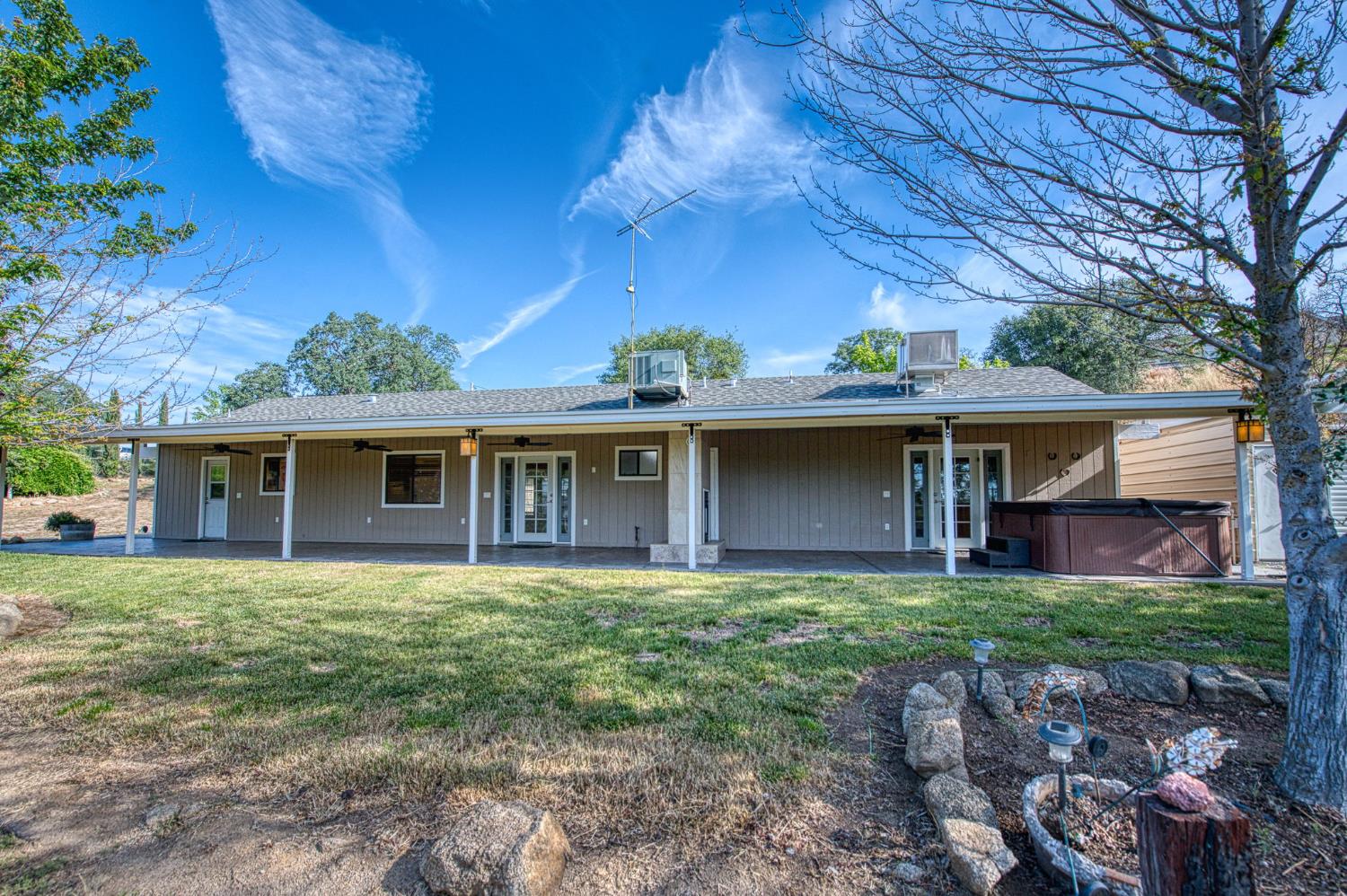 33717 River Knolls Road Coarsegold, CA 93614 - Photo 40 of 66 front view of a house with a yard