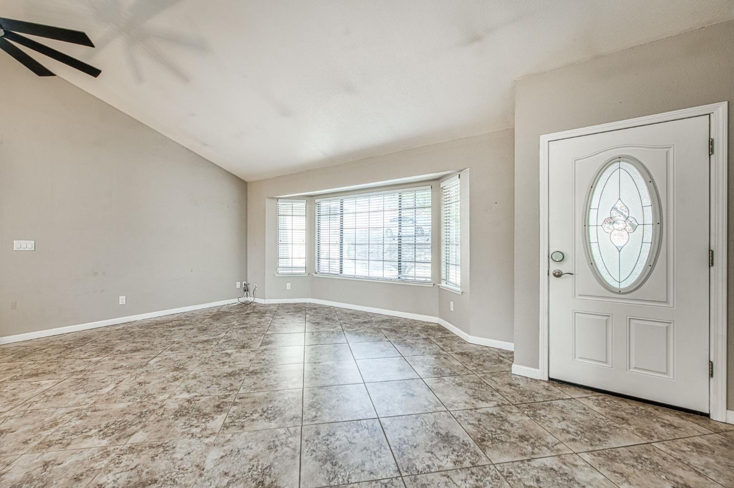 33717 River Knolls Road Coarsegold, CA 93614 - Photo 5 of 66 a view of an empty room with glass door