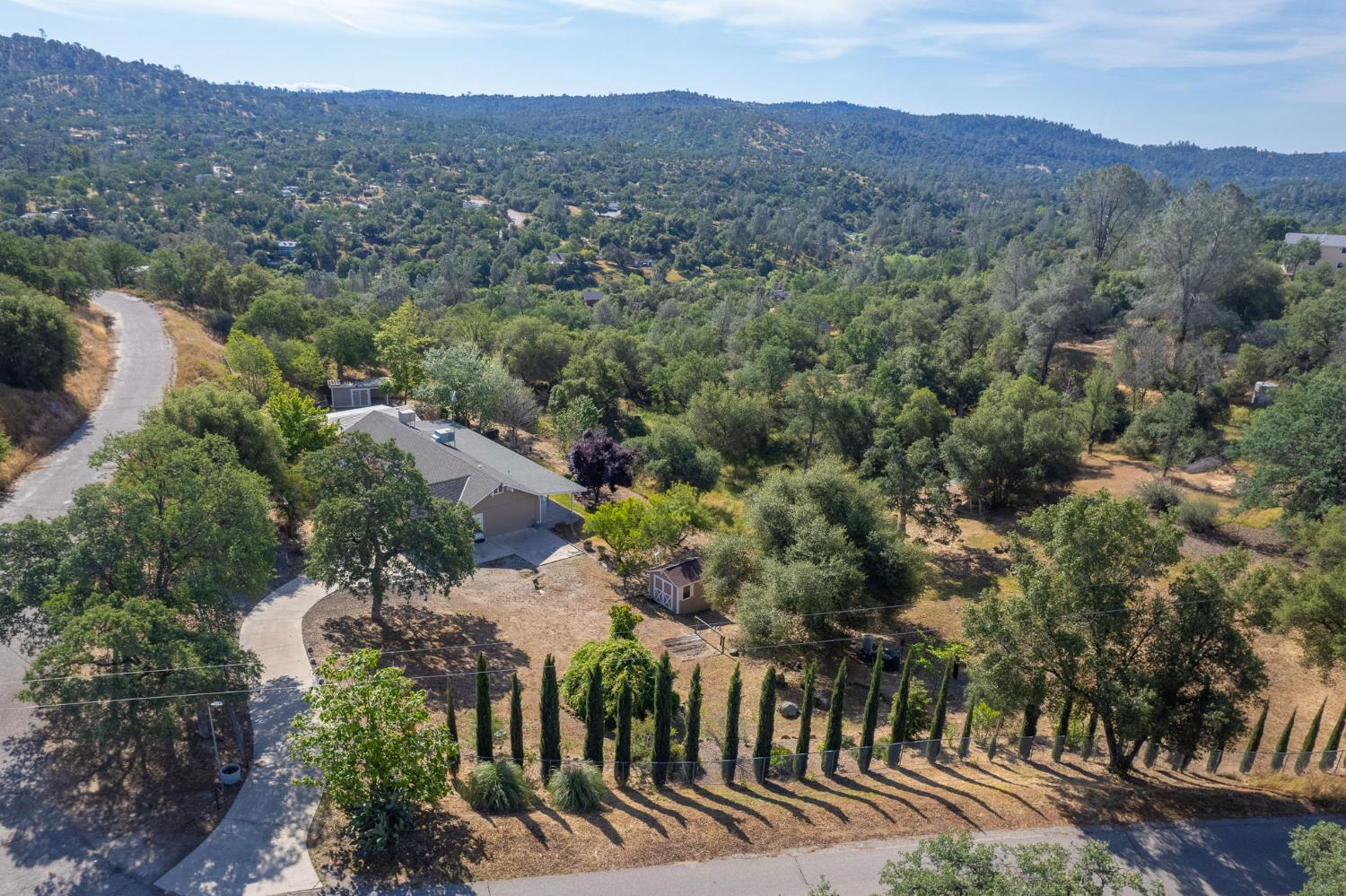 33717 River Knolls Road Coarsegold, CA 93614 - Photo 65 of 66 an aerial view of a house with a street