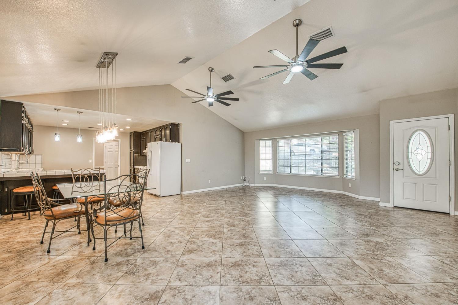 33717 River Knolls Road Coarsegold, CA 93614 - Photo 9 of 66 a view of a livingroom with furniture and a ceiling fan