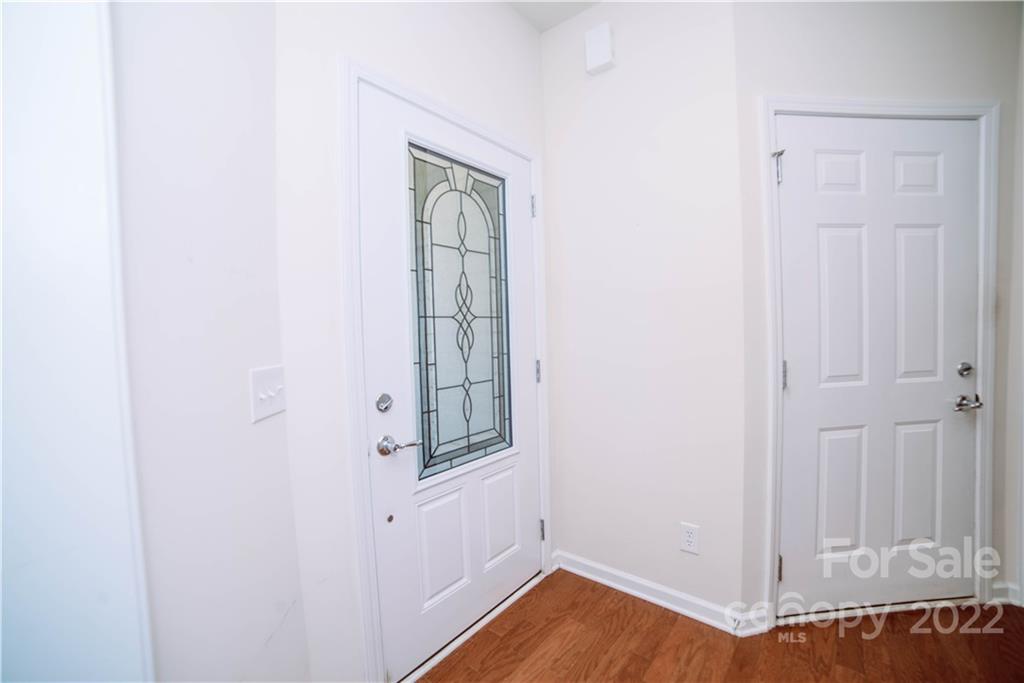 9005 Smokey Hill Road Indian Land, SC 29707 - Photo 11 of 30 a view of front door with wooden floor