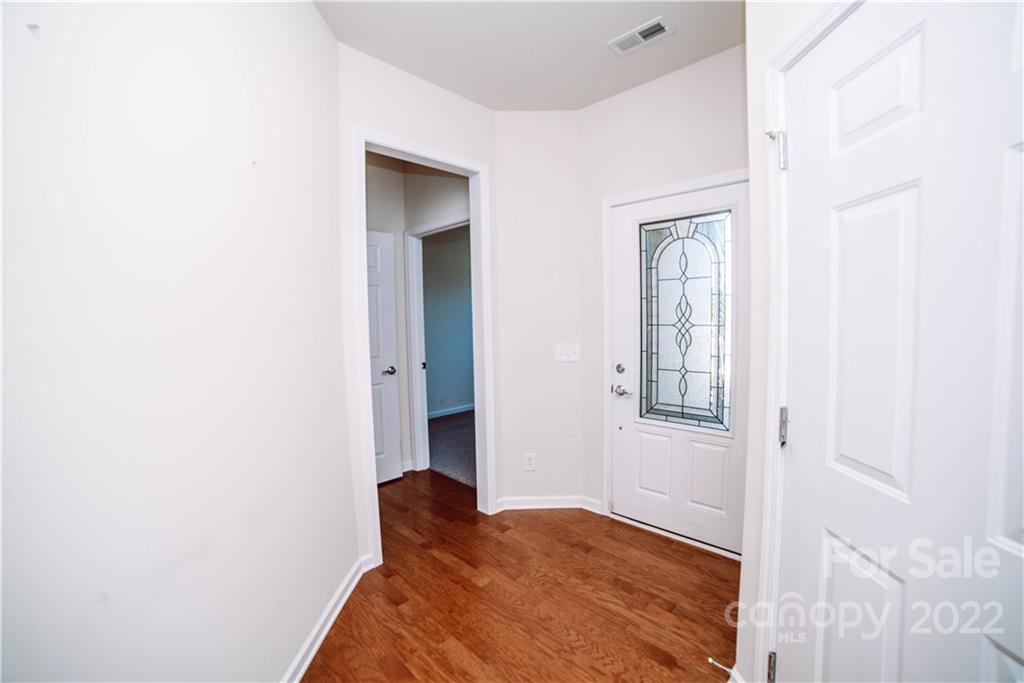 9005 Smokey Hill Road Indian Land, SC 29707 - Photo 21 of 30 a bedroom with a bed and a window