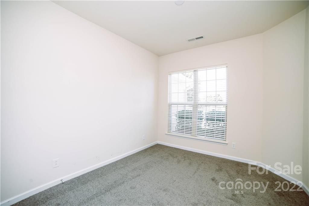 9005 Smokey Hill Road Indian Land, SC 29707 - Photo 22 of 30 an empty room with windows