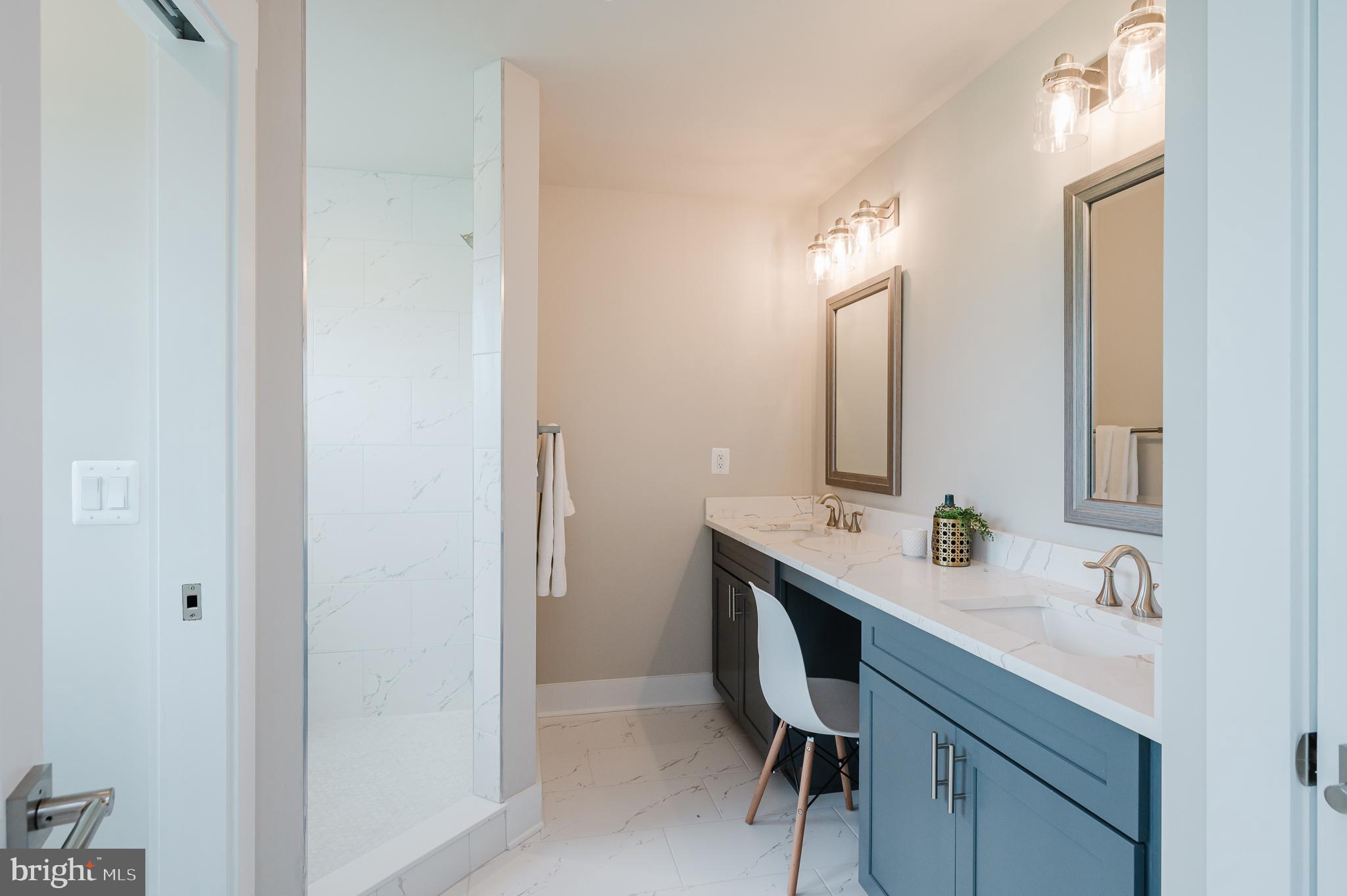 2647 Hoopes Road Forest Hill, MD 21050 - Photo 18 of 29 a bathroom with a double vanity sink and a mirror
