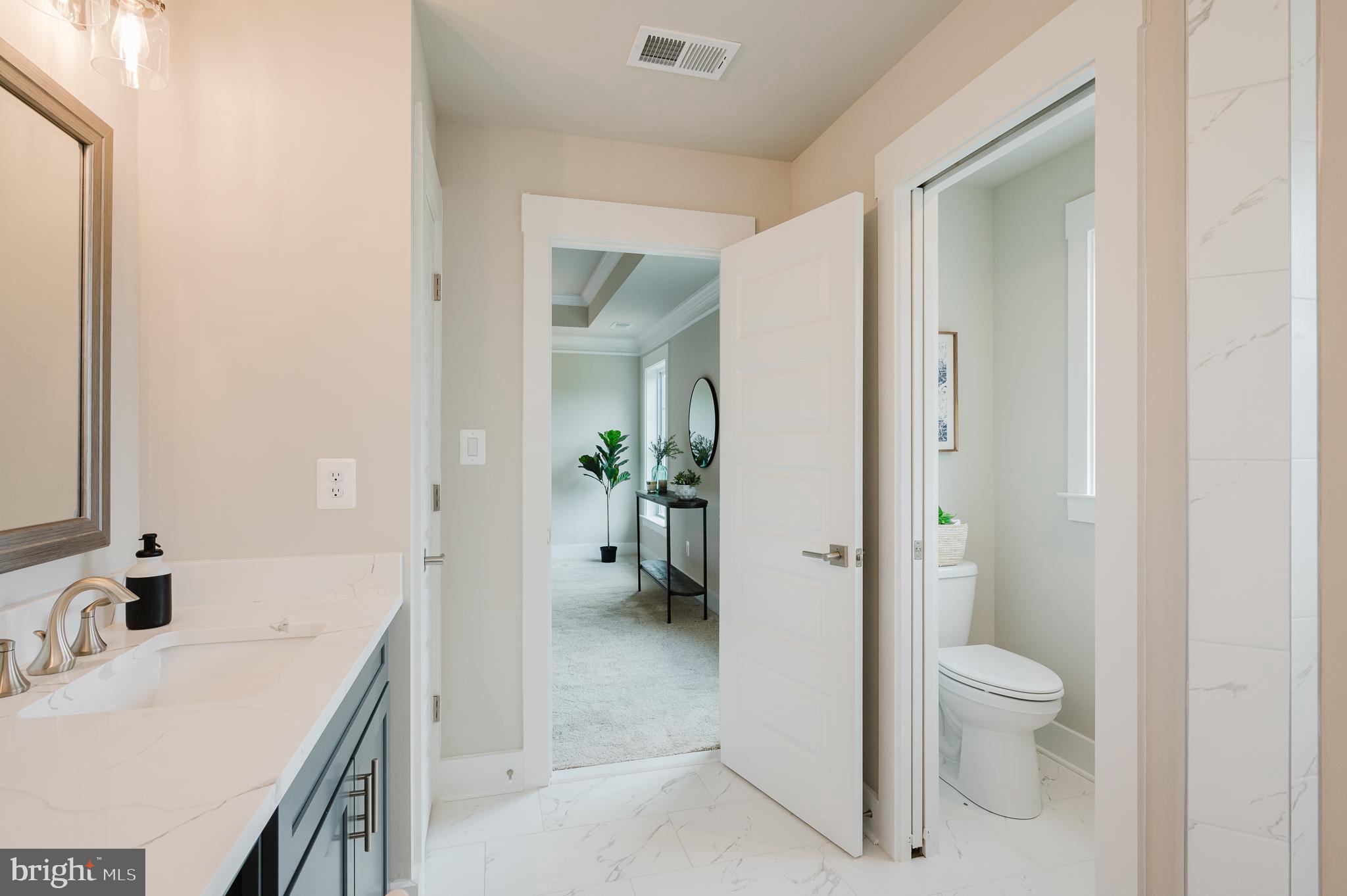 2647 Hoopes Road Forest Hill, MD 21050 - Photo 19 of 29 a bathroom with a granite countertop sink a toilet and shower