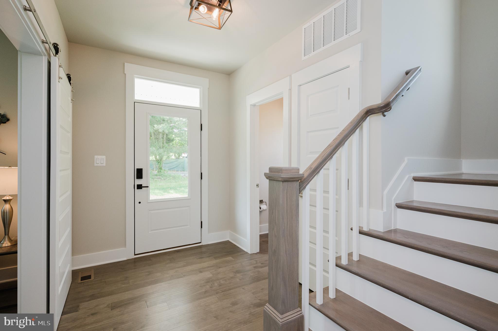 2647 Hoopes Road Forest Hill, MD 21050 - Photo 2 of 29 a view of entryway with wooden floor and stairs