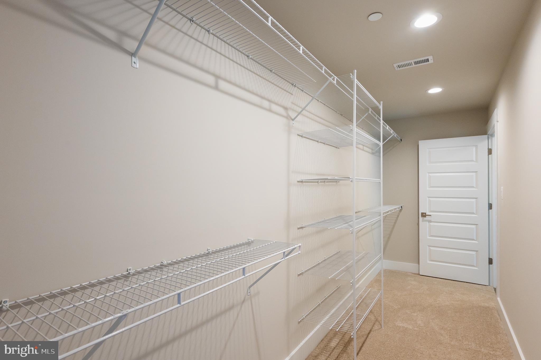 2647 Hoopes Road Forest Hill, MD 21050 - Photo 22 of 29 a view of walk in closet with empty racks