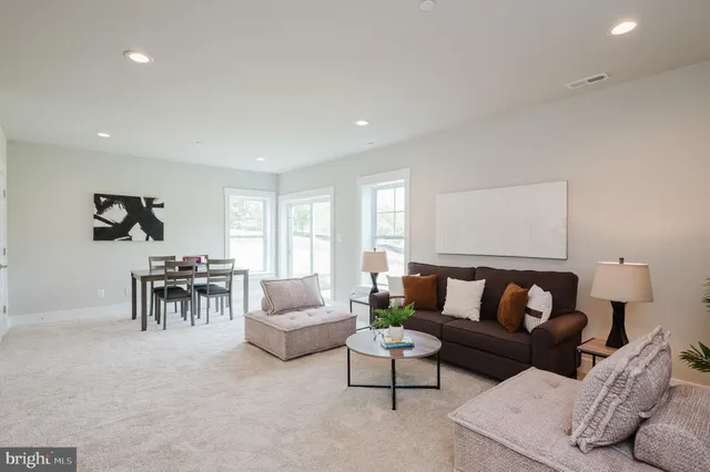 a living room with furniture and a couch