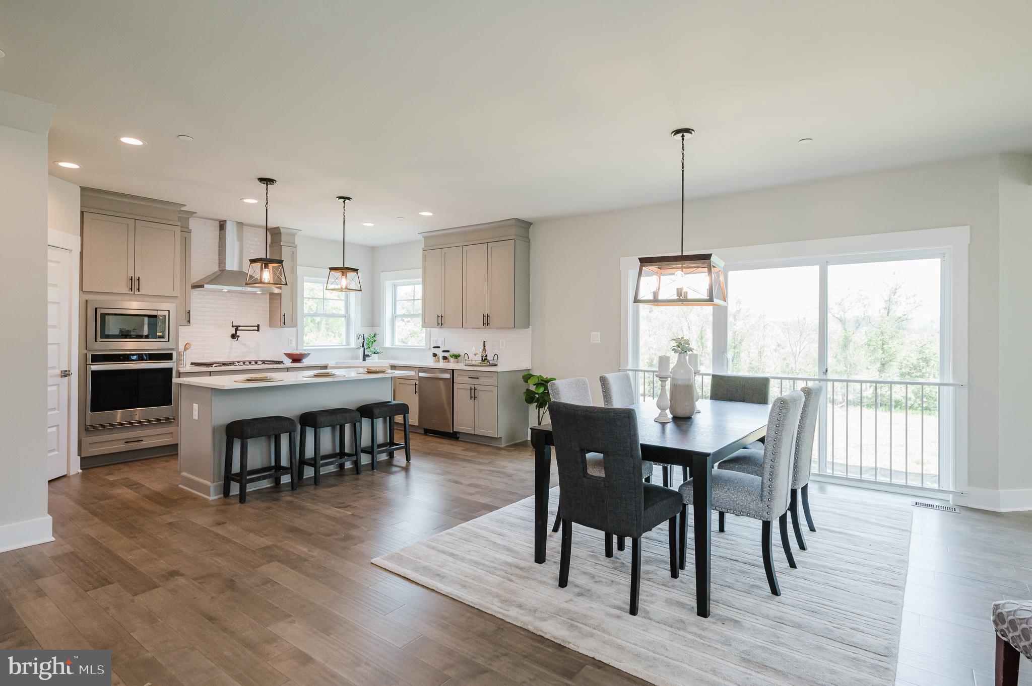 2647 Hoopes Road Forest Hill, MD 21050 - Photo 3 of 29 a view of a dining room with furniture window and wooden floor