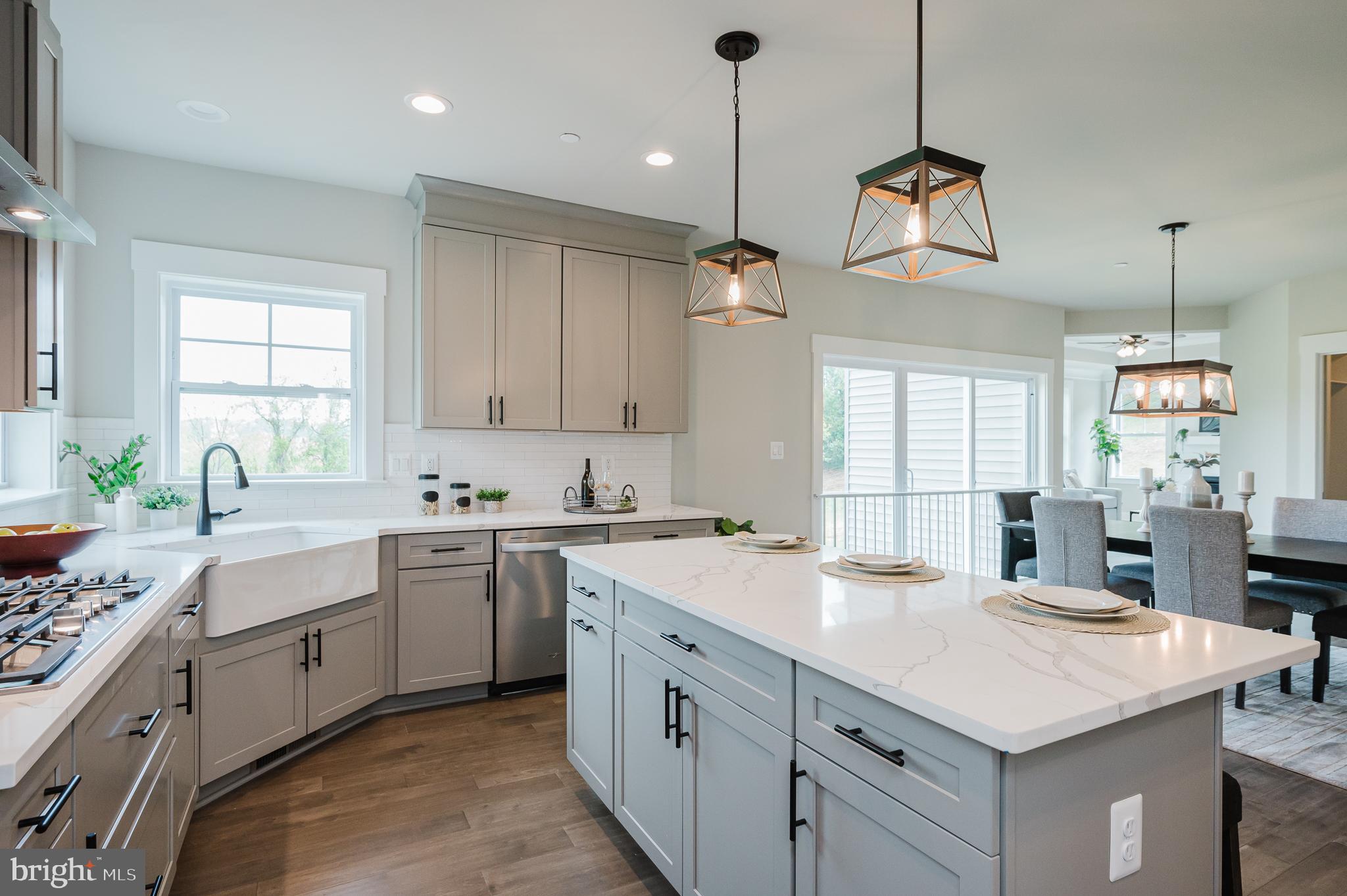 2647 Hoopes Road Forest Hill, MD 21050 - Photo 8 of 29 a kitchen with a stove a sink a center island and a window