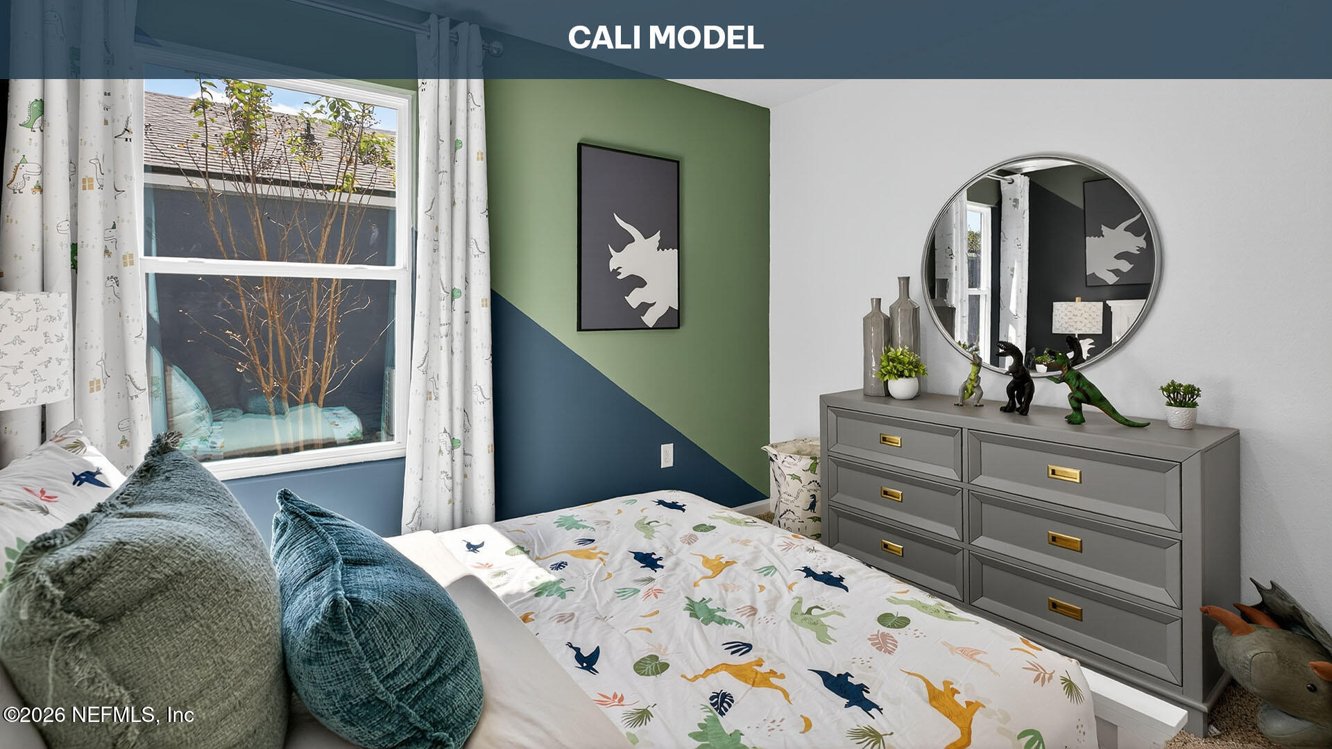 12244 Yew Tree Road Jacksonville, FL 32218 - Photo 25 of 57 a bedroom with a bed and a mirror on dresser