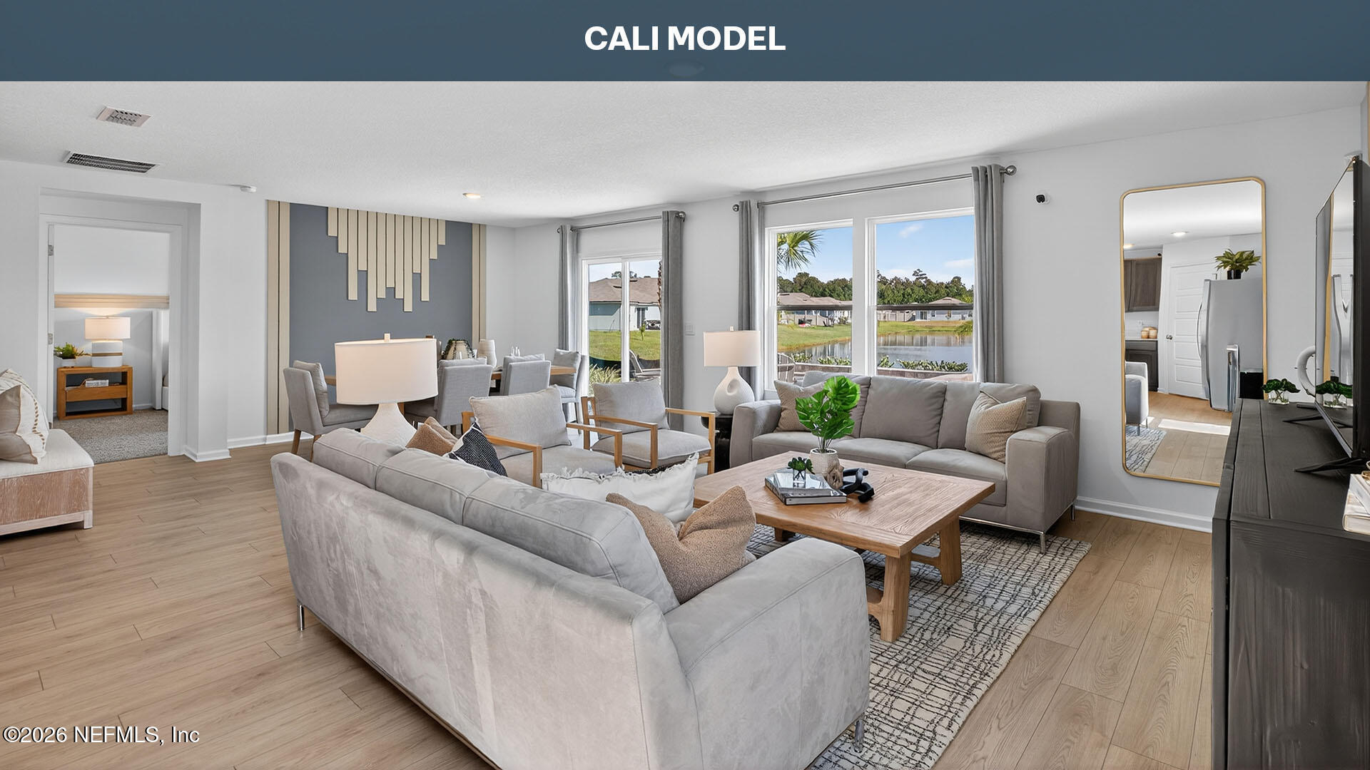 12244 Yew Tree Road Jacksonville, FL 32218 - Photo 10 of 57 a living room with furniture and a large window