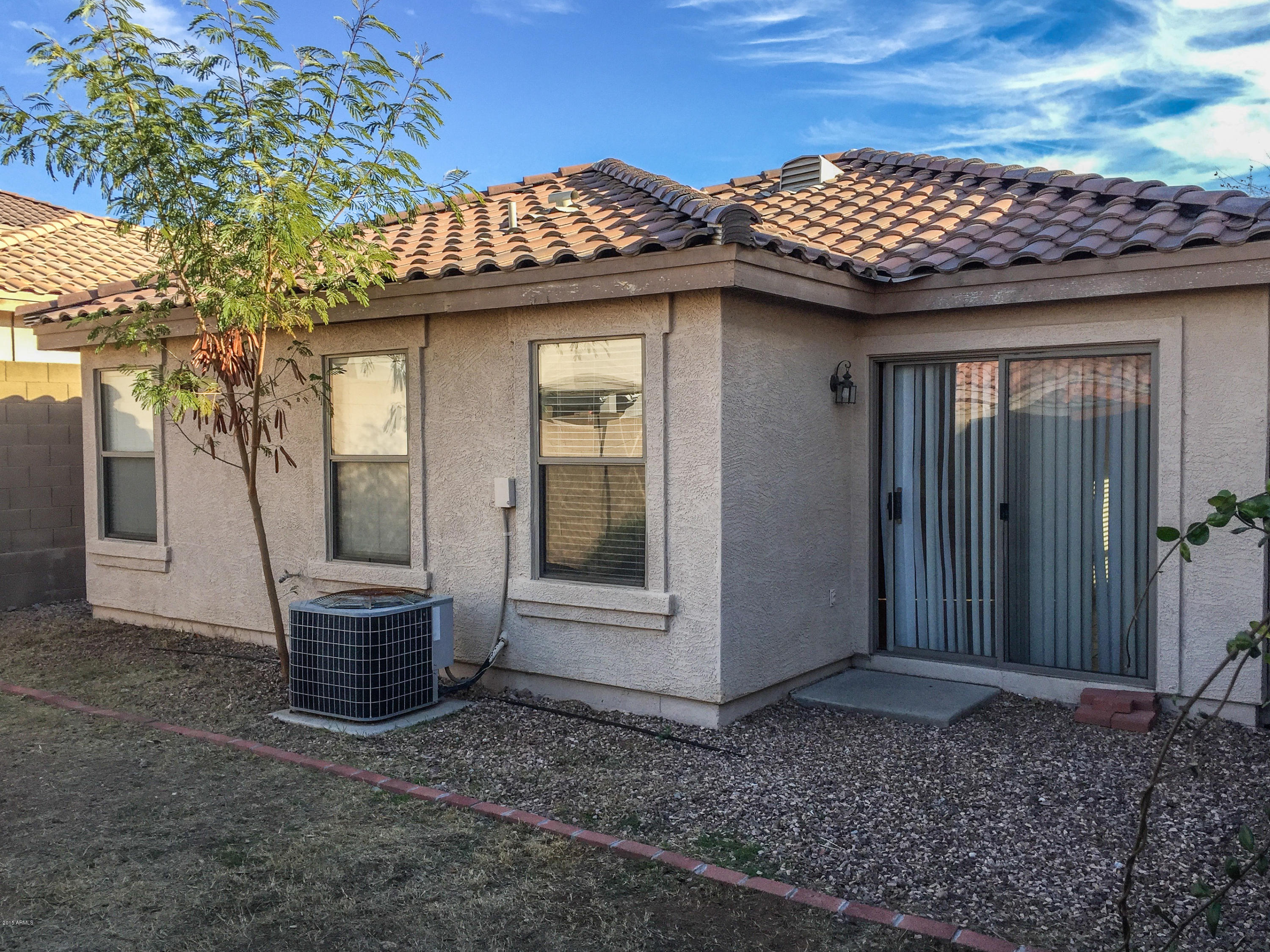 3338 South Conestoga Road Apache Junction, AZ 85119 - Photo 4 of 10 a front view of a house with entryway