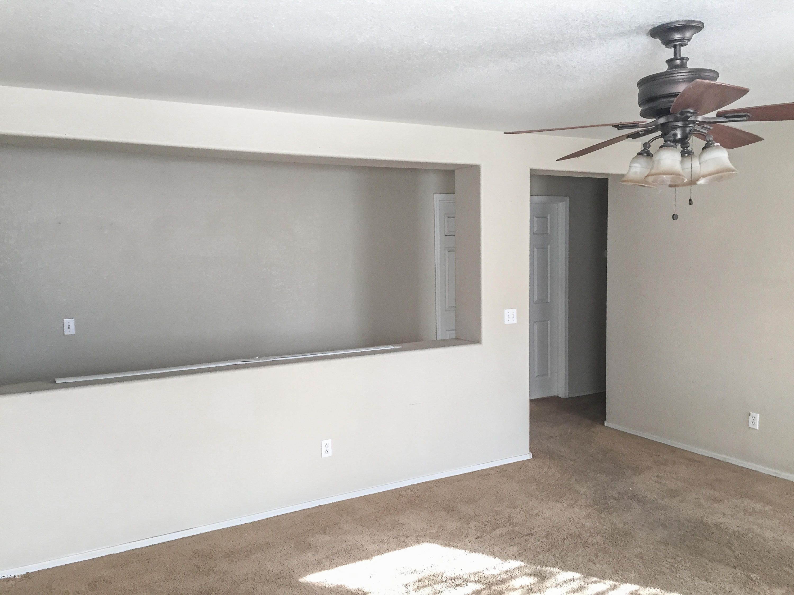 3338 South Conestoga Road Apache Junction, AZ 85119 - Photo 5 of 10 a view of a room with a ceiling fan