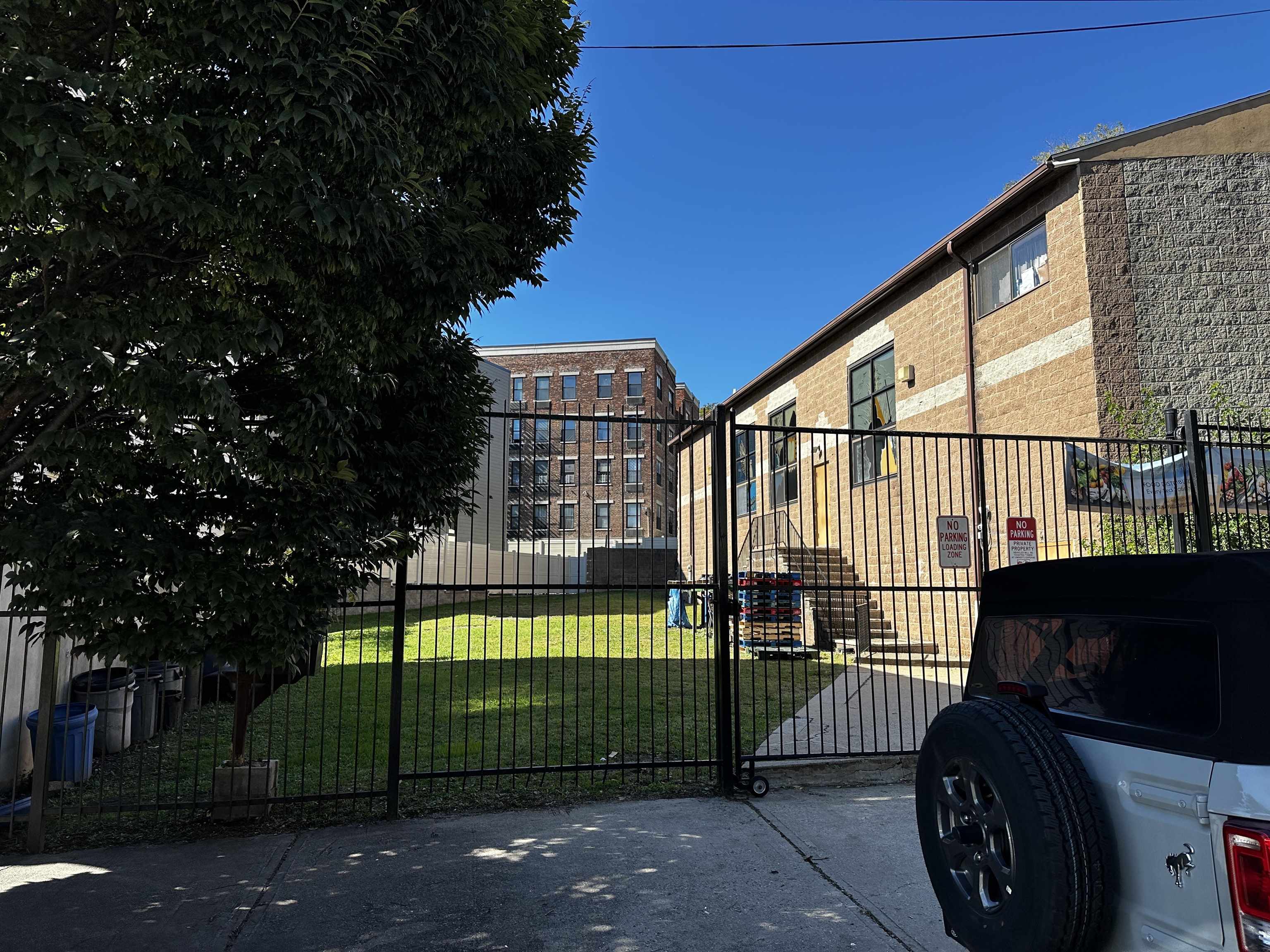 a view of a wrought iron fences in front of house