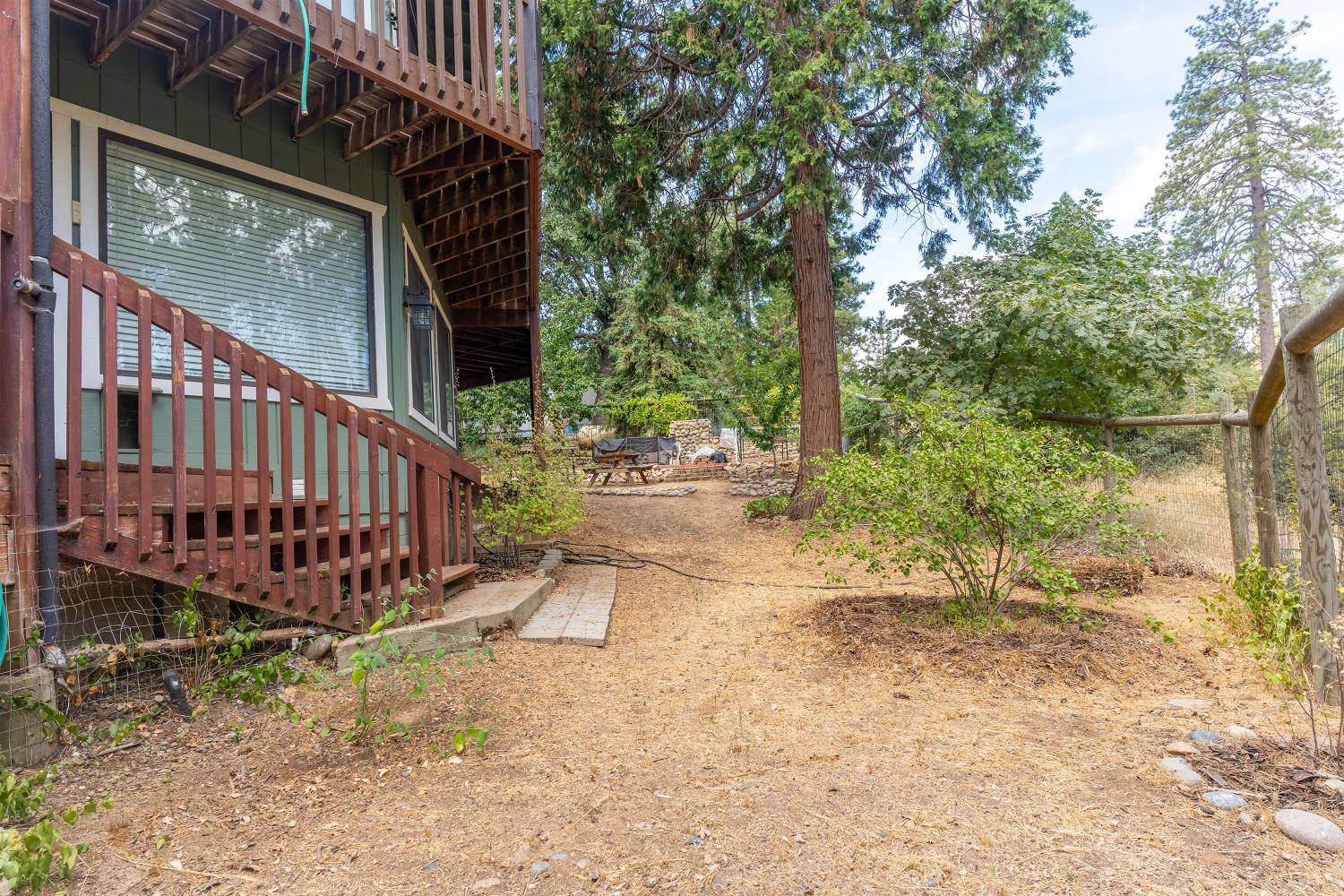 33952 Tocaloma Road Auberry, CA 93602 - Photo 37 of 39 front view of a house with a yard