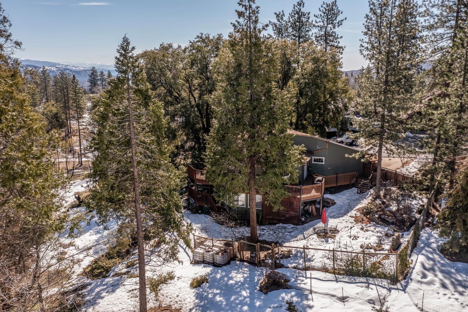 33952 Tocaloma Road Auberry, CA 93602 - Photo 38 of 39 a backyard of a house with outdoor seating