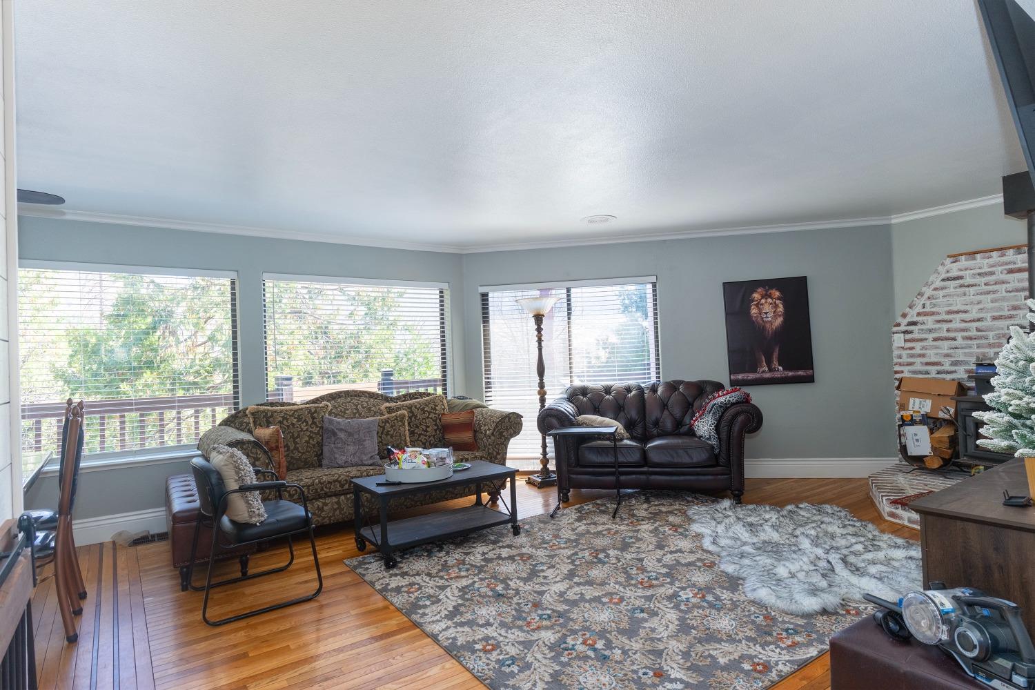33952 Tocaloma Road Auberry, CA 93602 - Photo 10 of 39 a living room with furniture and a large window