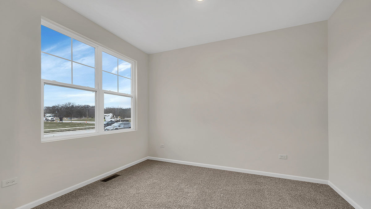14951 West Yorkshire Street Manhattan, IL 60442 - Photo 3 of 30 a view of an empty room with a window