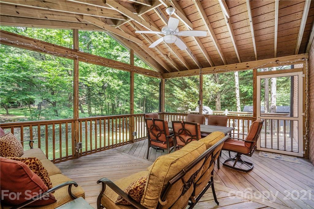 613 Neill Ridge Road Matthews, NC 28105 - Photo 14 of 25 a view of a chairs in wooden deck