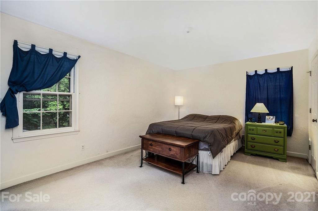 613 Neill Ridge Road Matthews, NC 28105 - Photo 16 of 25 a bedroom with a bed and window