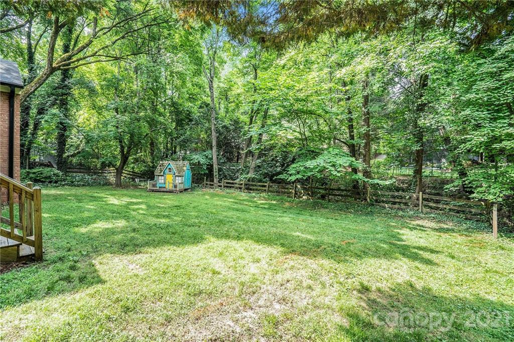 613 Neill Ridge Road Matthews, NC 28105 - Photo 20 of 25 a view of a tree in a yard