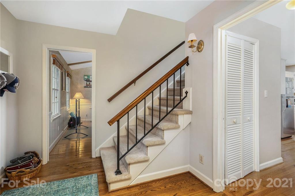 613 Neill Ridge Road Matthews, NC 28105 - Photo 3 of 25 a view of entryway and hall with wooden floor