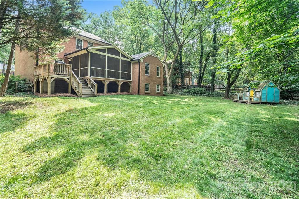613 Neill Ridge Road Matthews, NC 28105 - Photo 23 of 25 a view of a house with backyard