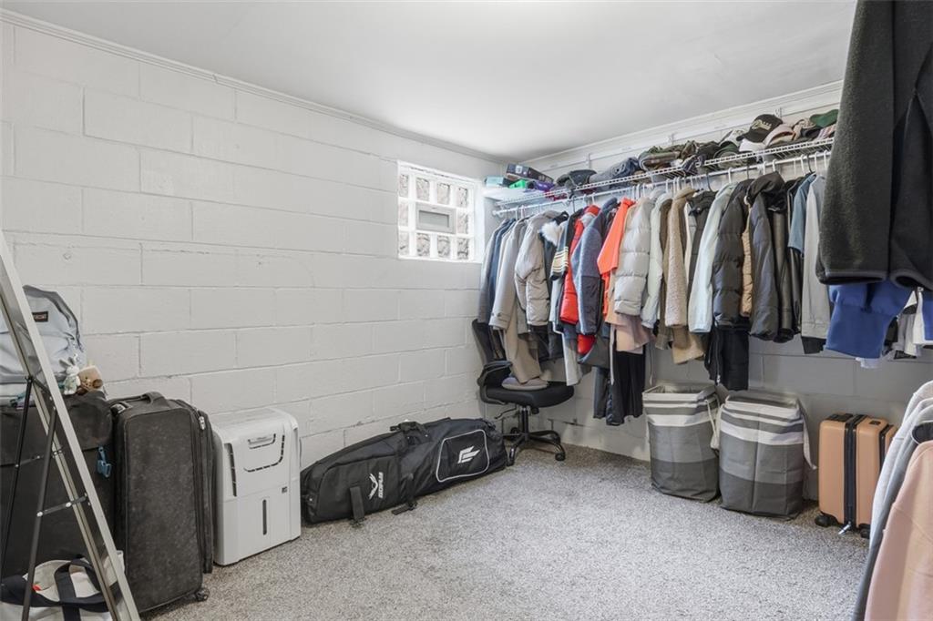 1202 Sarah Street Pittsburgh, PA 15203 - Photo 16 of 37 a view of walk in closet with clothes