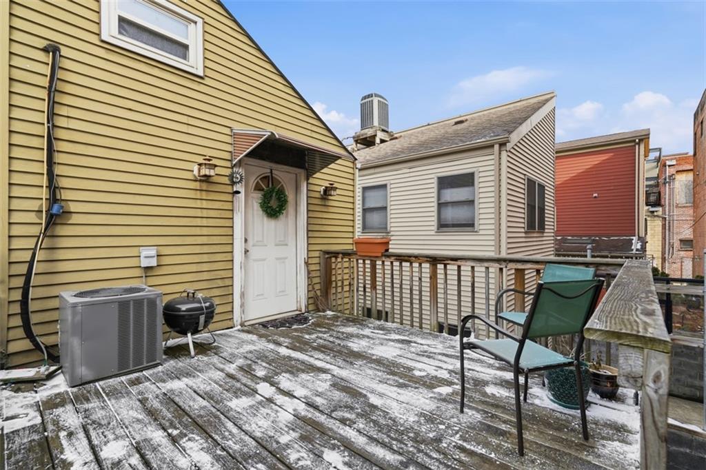 1202 Sarah Street Pittsburgh, PA 15203 - Photo 20 of 39 a view of a house with backyard and porch