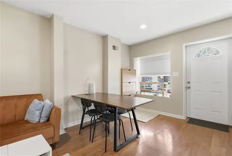 a living room with furniture and a table