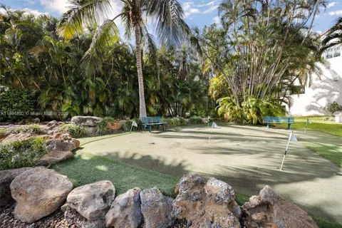 a view of swimming pool with a yard