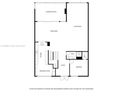 a view of living room with a table and white walls