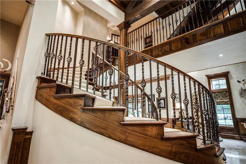 399 Cornetti Road Fenelton, PA 16034 - Photo 12 of 25 a view of staircase with lots of frames on wall and windows