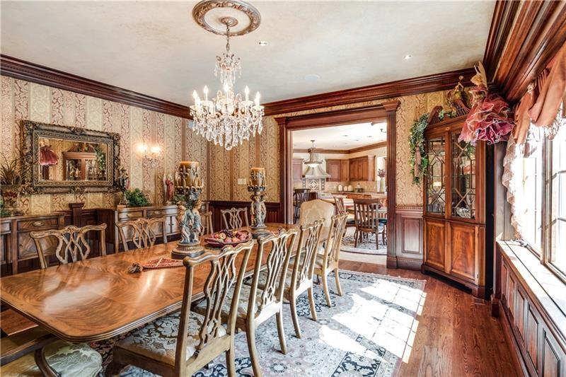 399 Cornetti Road Fenelton, PA 16034 - Photo 7 of 25 a view of a dining room with furniture and wooden floor