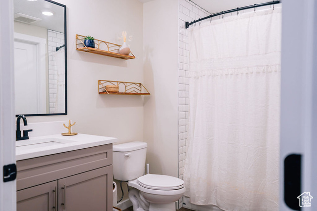 961 West Akoya Pearl Road, Unit 201 St. George, UT 84790 - Photo 26 of 67 Full bath featuring vanity and toilet