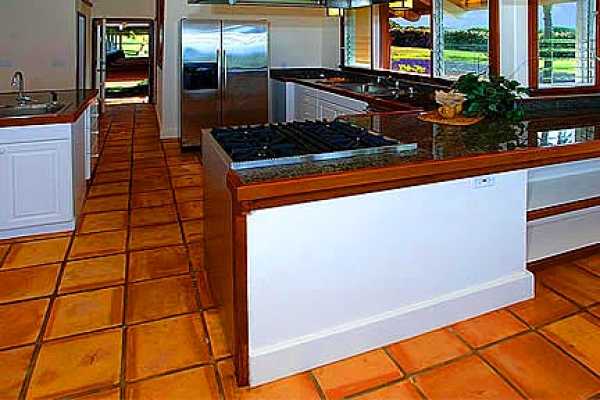 7463 B Koolau Road Kilauea, HI 96754 - Photo 3 of 21 a kitchen with stainless steel appliances a sink stove and large window