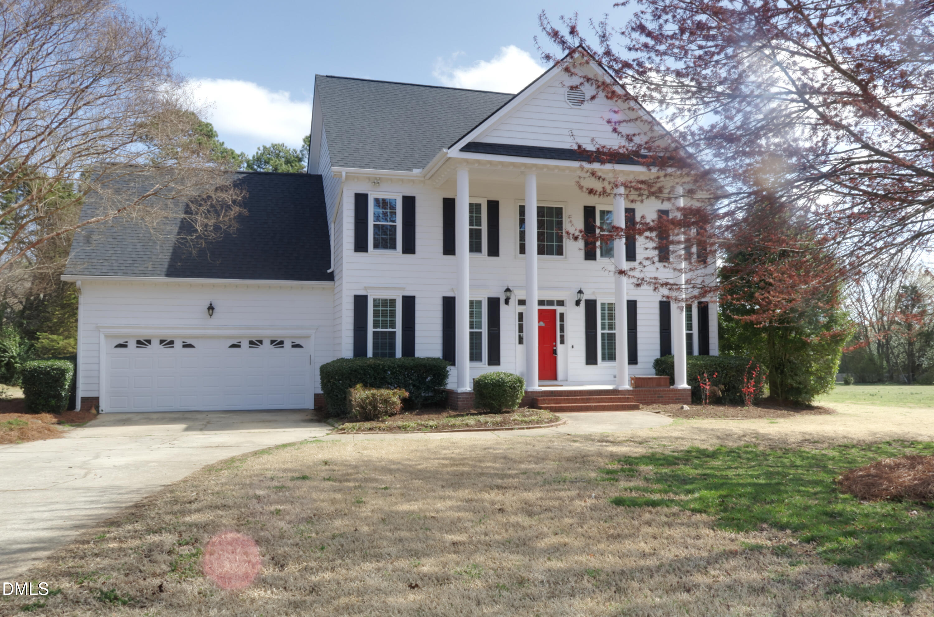 2504 Pennyshire Lane Raleigh, NC 27606 - Photo 2 of 32 a front view of a house with a yard