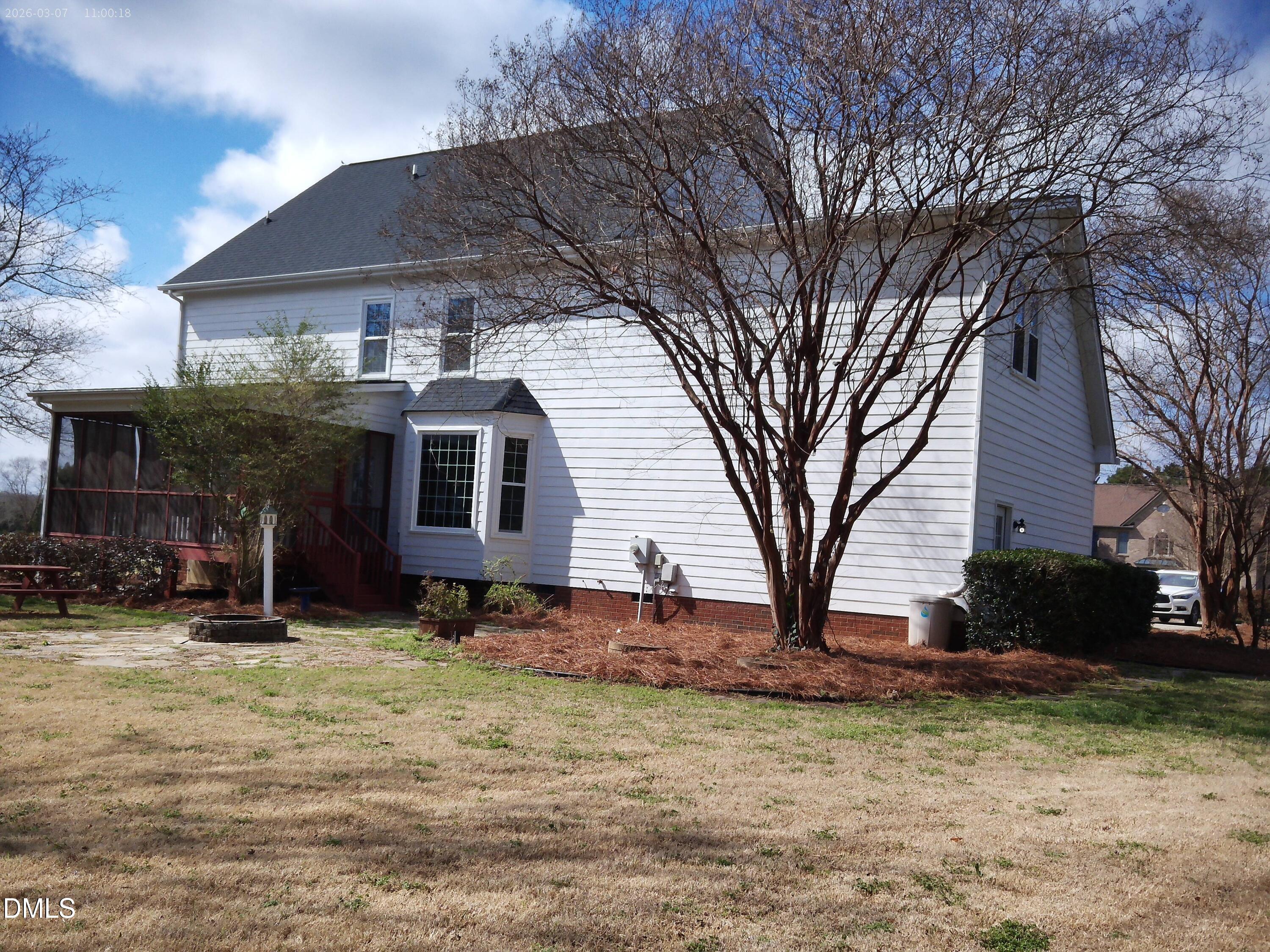 2504 Pennyshire Lane Raleigh, NC 27606 - Photo 27 of 32 a front view of a house with a yard