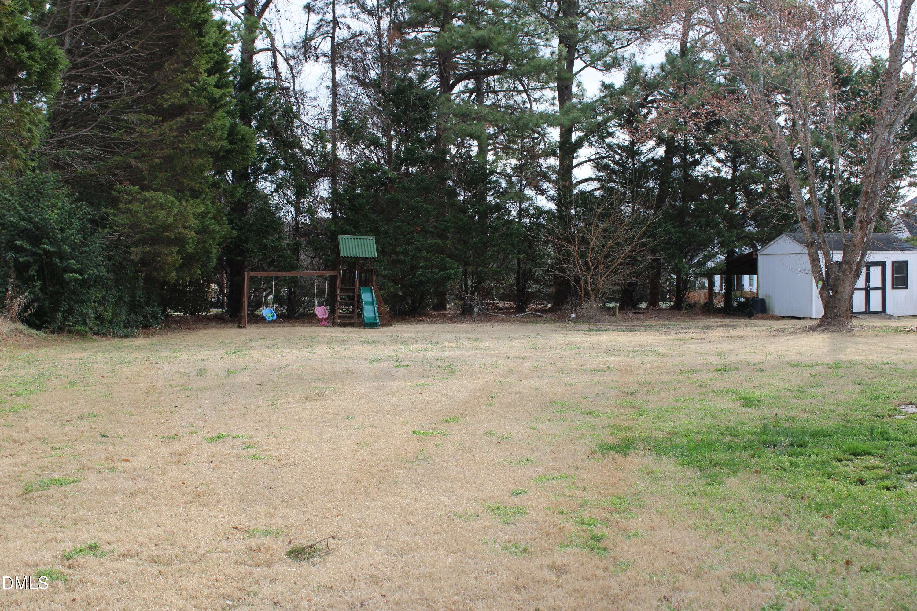 2504 Pennyshire Lane Raleigh, NC 27606 - Photo 29 of 32 a view of outdoor space with trees