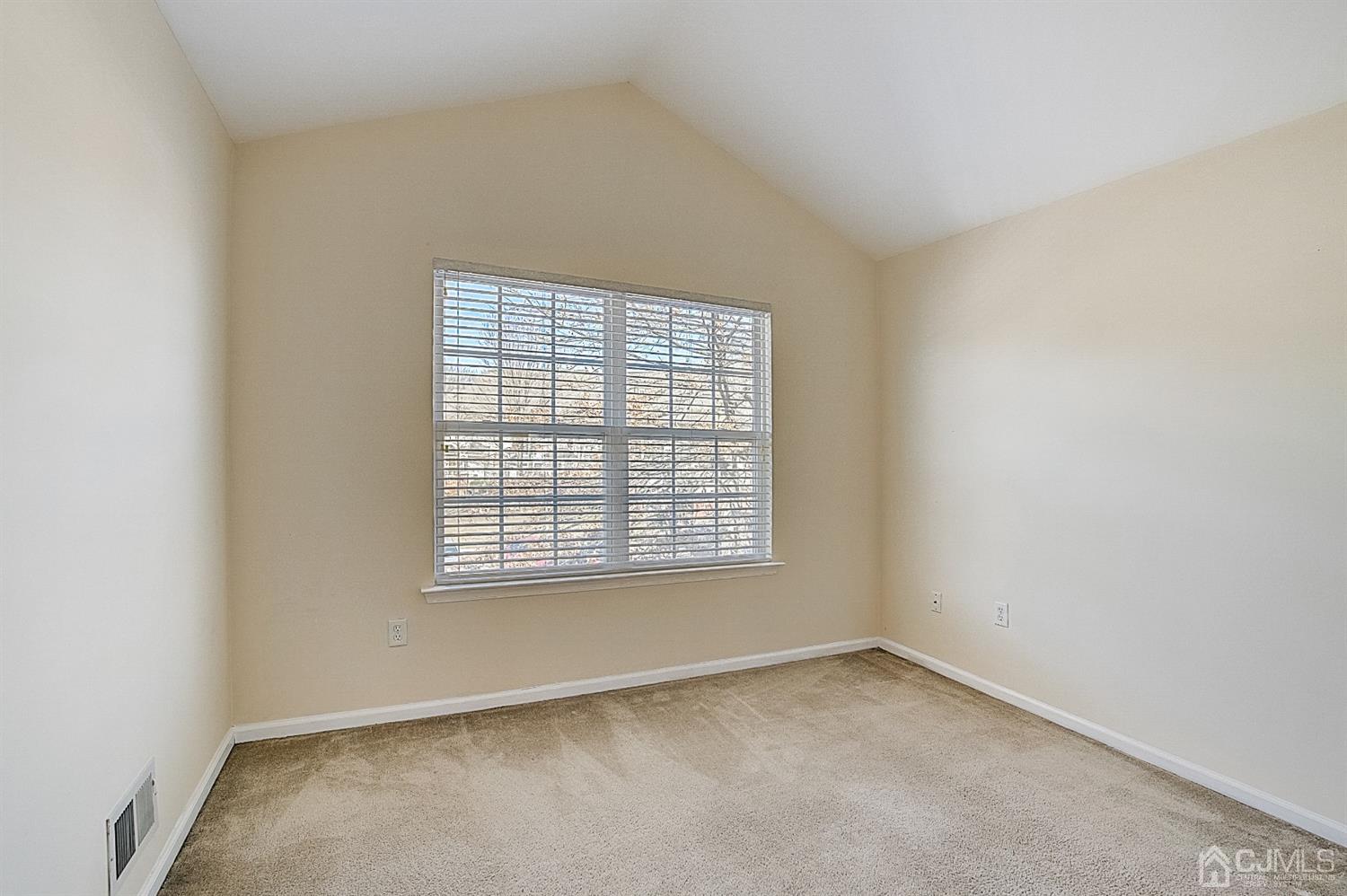 38 Hawthorne Road North Brunswick, NJ 08902 - Photo 18 of 26 an empty room with a window