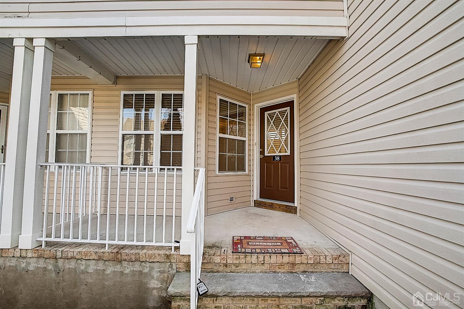 38 Hawthorne Road North Brunswick, NJ 08902 - Photo 2 of 26 a view of a brick house with large windows