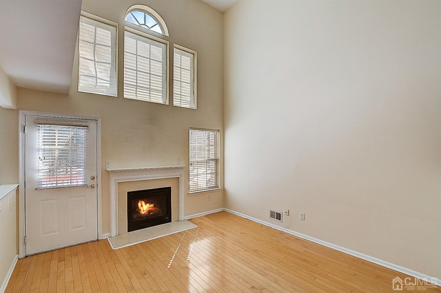 38 Hawthorne Road North Brunswick, NJ 08902 - Photo 4 of 26 a view of empty room with a fireplace