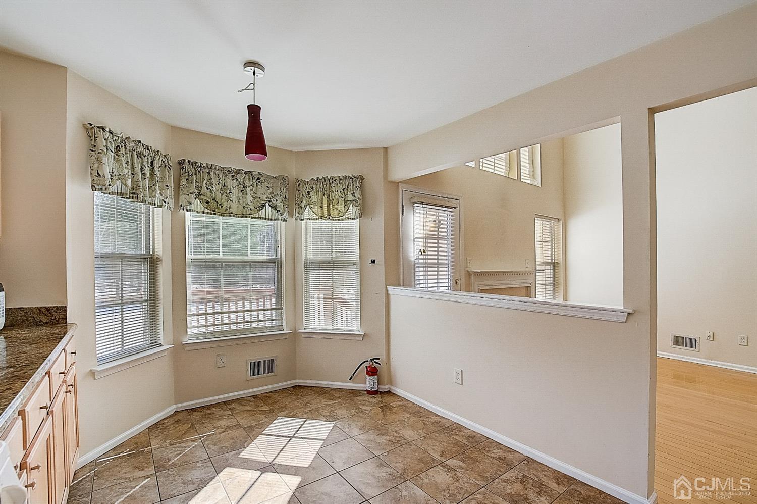 38 Hawthorne Road North Brunswick, NJ 08902 - Photo 9 of 26 a view of an empty room with a window