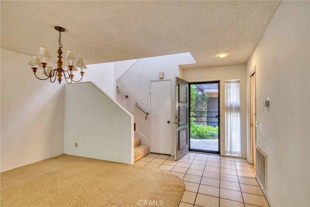 267 Linwood Avenue, Unit E Monrovia, CA 91016 - Photo 8 of 33 a view of a livingroom with a staircase