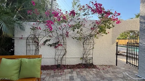 a view of a bench in a backyard