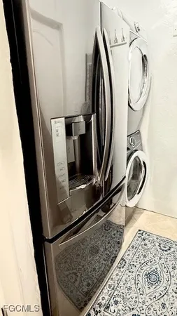 a close view of light fixtures and a mirror of a bathroom