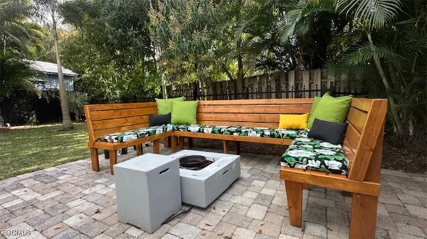 a view of a chairs and table in the patio