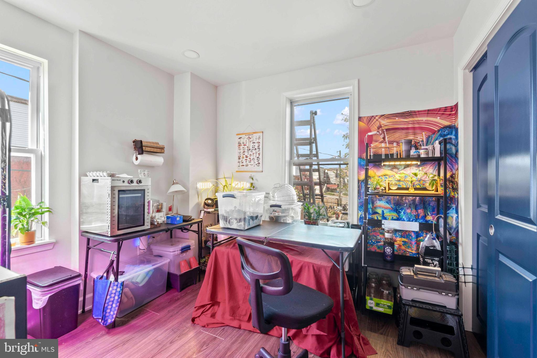 1602 Cypress Street Curtis Bay, MD 21226 - Photo 17 of 42 a living room with furniture a rug and a window